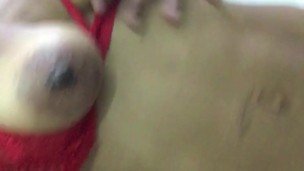 hot brunette films her tits and fingers her pussy in her room