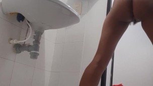 I record myself in the bathroom while I finger my pussy