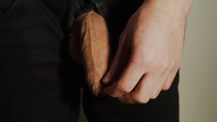 Thick uncut dick growing in black jeans. Natural foreskin. Cum on black plate.